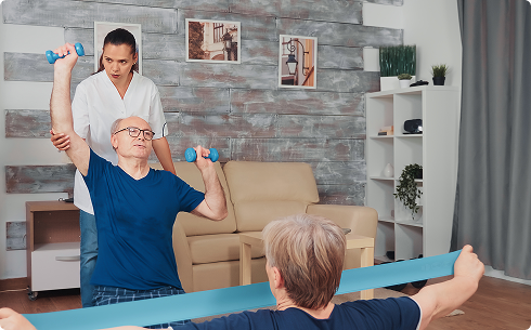 nurse-doing-physical-therapy-with-senior-couple-home-assistance-physiotherapy-healthy-lifestyle-old-person-training-healthy-lifestyle 2