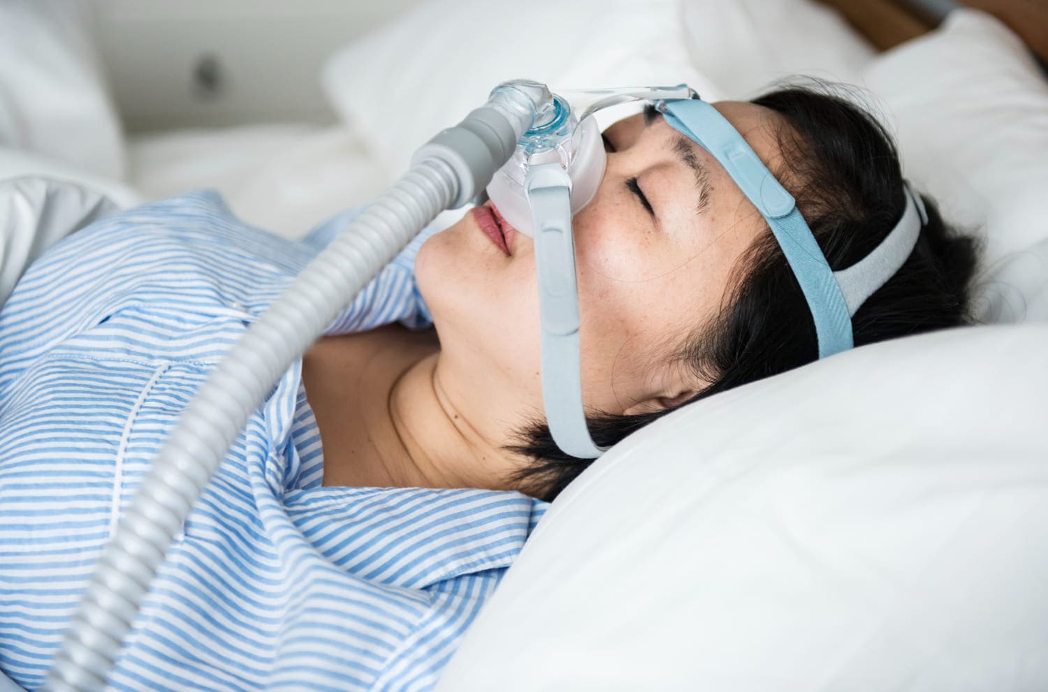 woman-wearing-anti-snoring-chin-straps